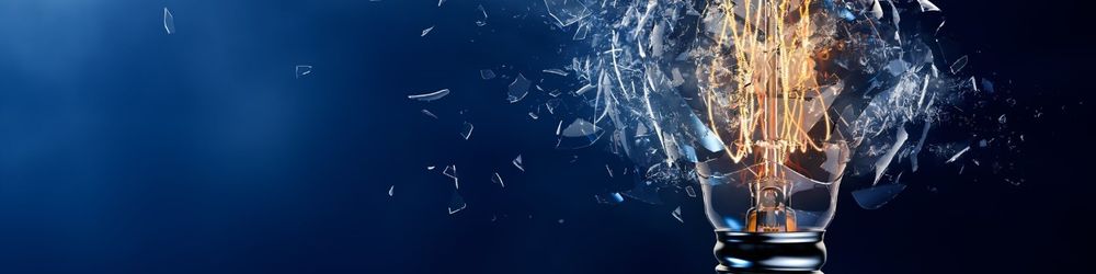 shattered light bulb symbolizing eureka moment