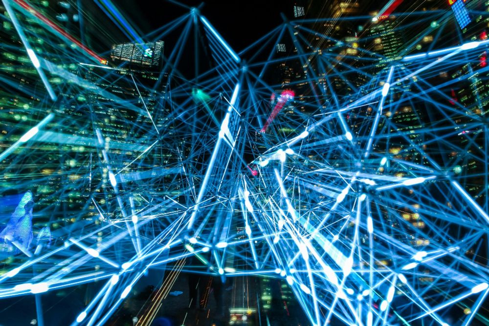 Abstract network of blue light connections representing AI data Processing
